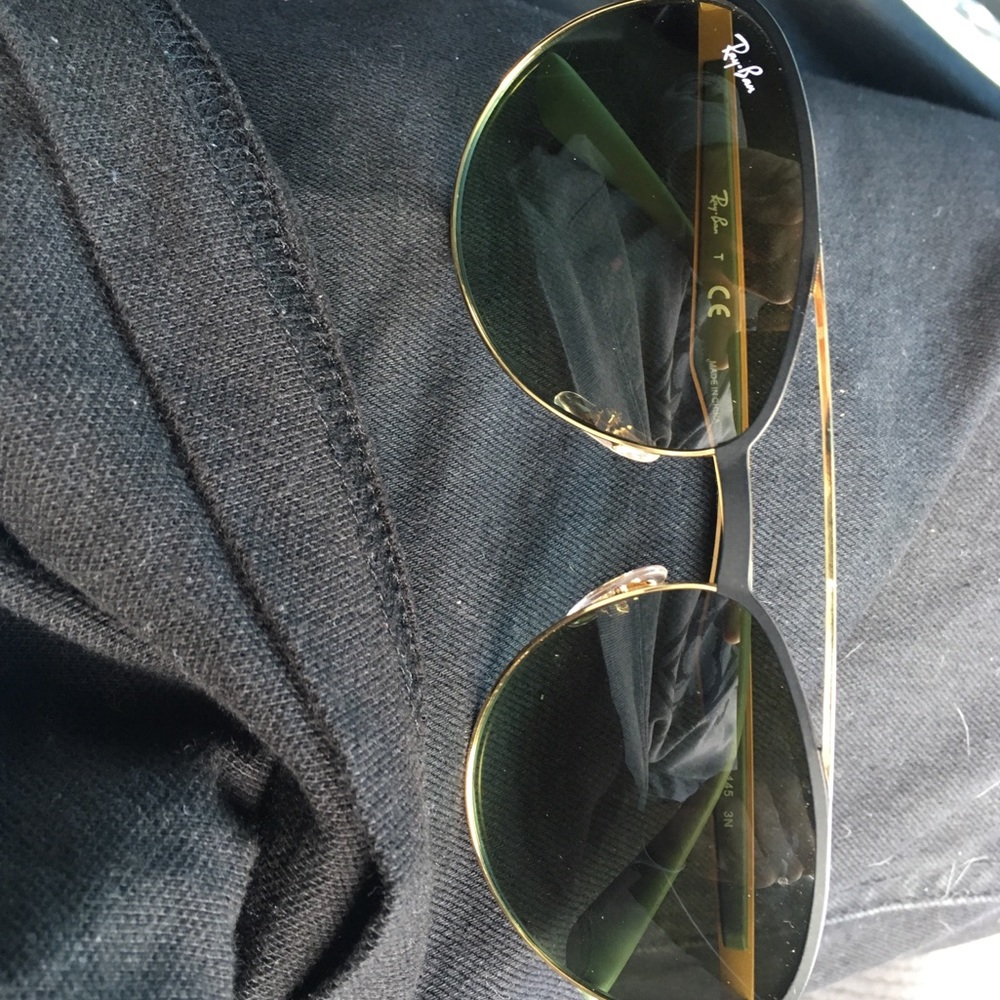 Dark green tints, gold trim rayban aviator glasses